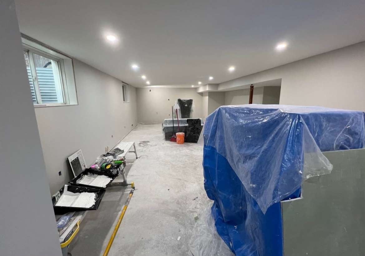 Basement painted with pot lights in